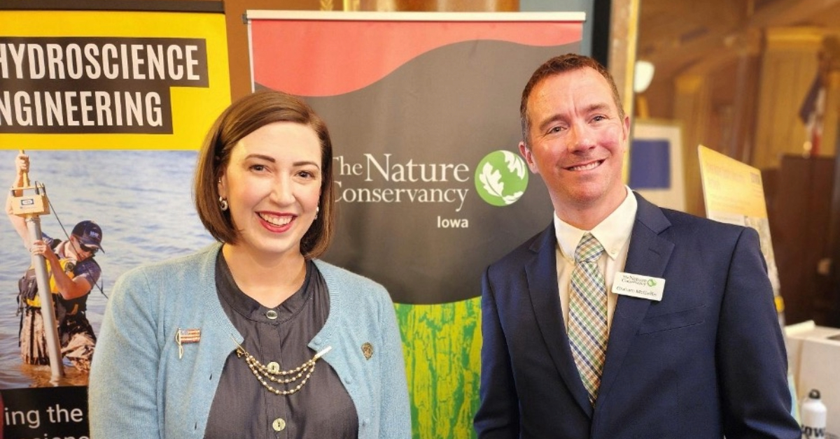 Iowa Senator Drey standing with conservation representative from The Nature Conservancy of Iowa at Gift to Iowa’s Future Day